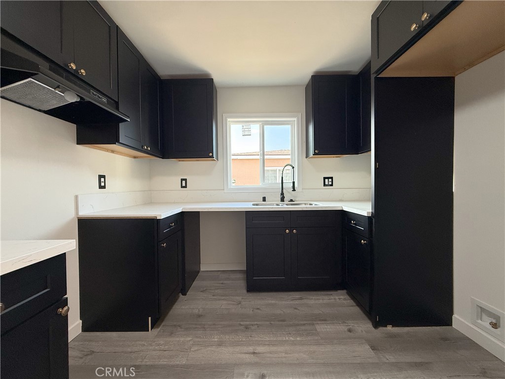 521 West Cherry Street Compton, CA 90222 - Photo 6 of 20 a spacious bathroom with a double vanity sink and mirror