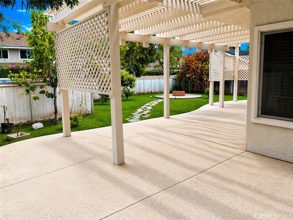 117 East Yale Loop, Unit 24 Irvine, CA 92604 - Photo 12 of 13 a view of garden with patio