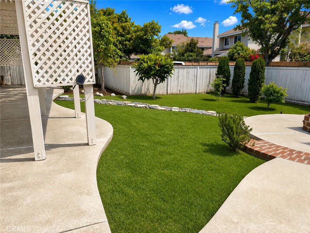 117 East Yale Loop, Unit 24 Irvine, CA 92604 - Photo 13 of 13 a view of a garden with a slide