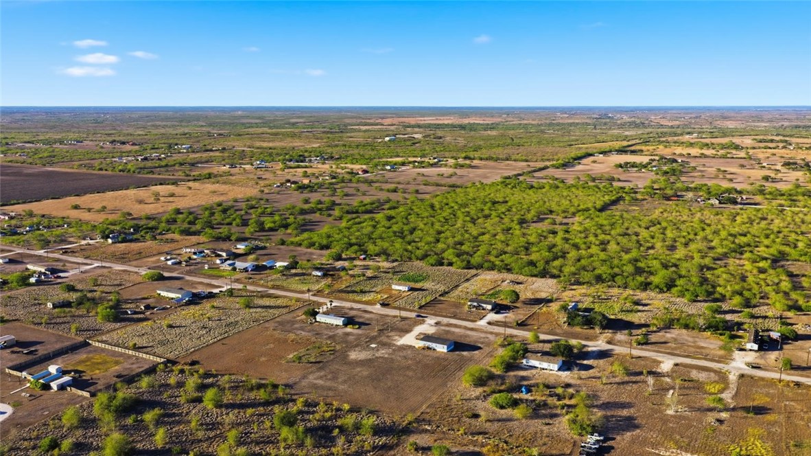 553 Jennifer Loop Orange Grove, TX 78372 - Photo 23 of 30 an aerial view of residential building and ocean
