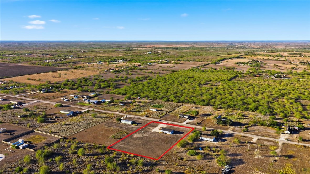 553 Jennifer Loop Orange Grove, TX 78372 - Photo 28 of 30 an aerial view of residential building and ocean