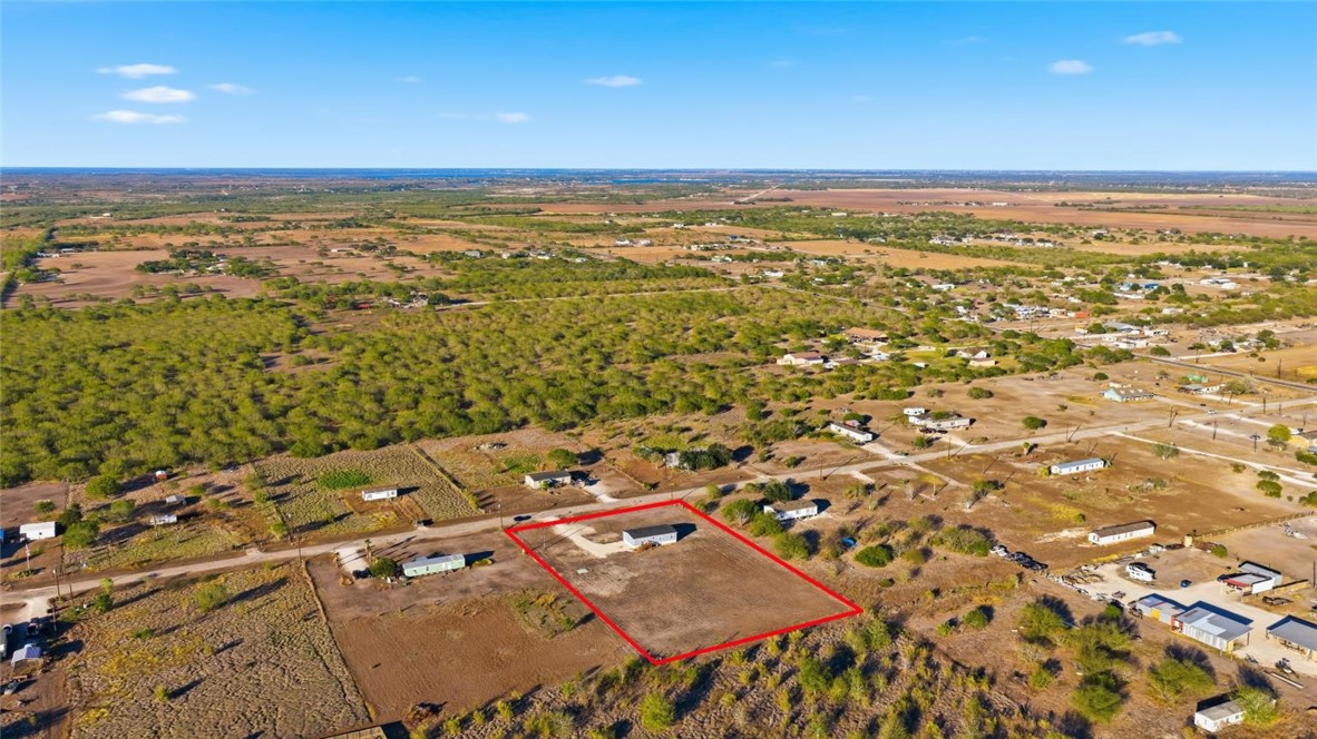 553 Jennifer Loop Orange Grove, TX 78372 - Photo 30 of 30 an aerial view of residential building and ocean