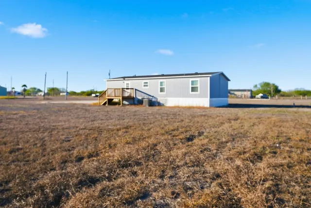 a view of a outdoor space with large trees