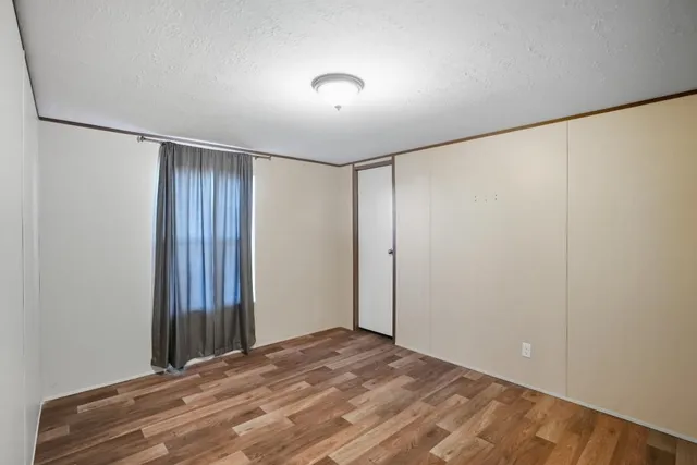 a view of a room with an empty space