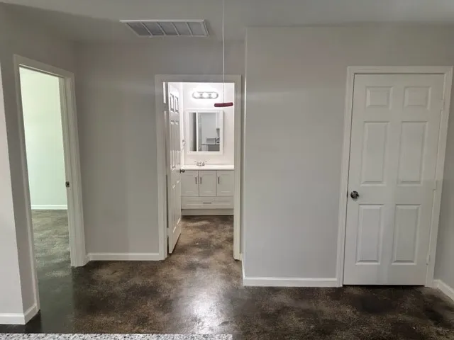 an empty room with windows