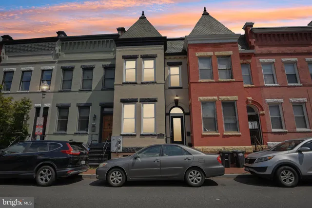 a car parked in front of a house