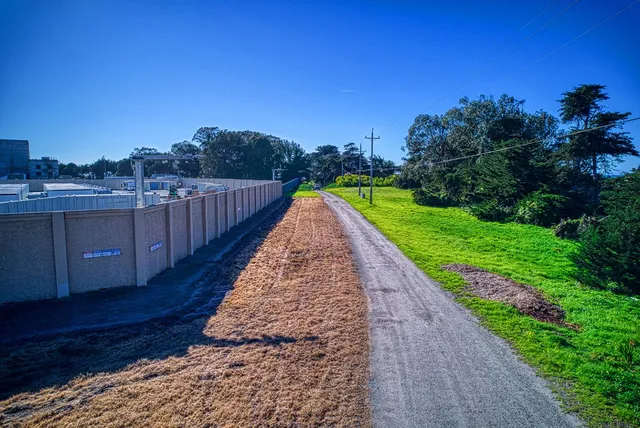 a view of a lake with a yard