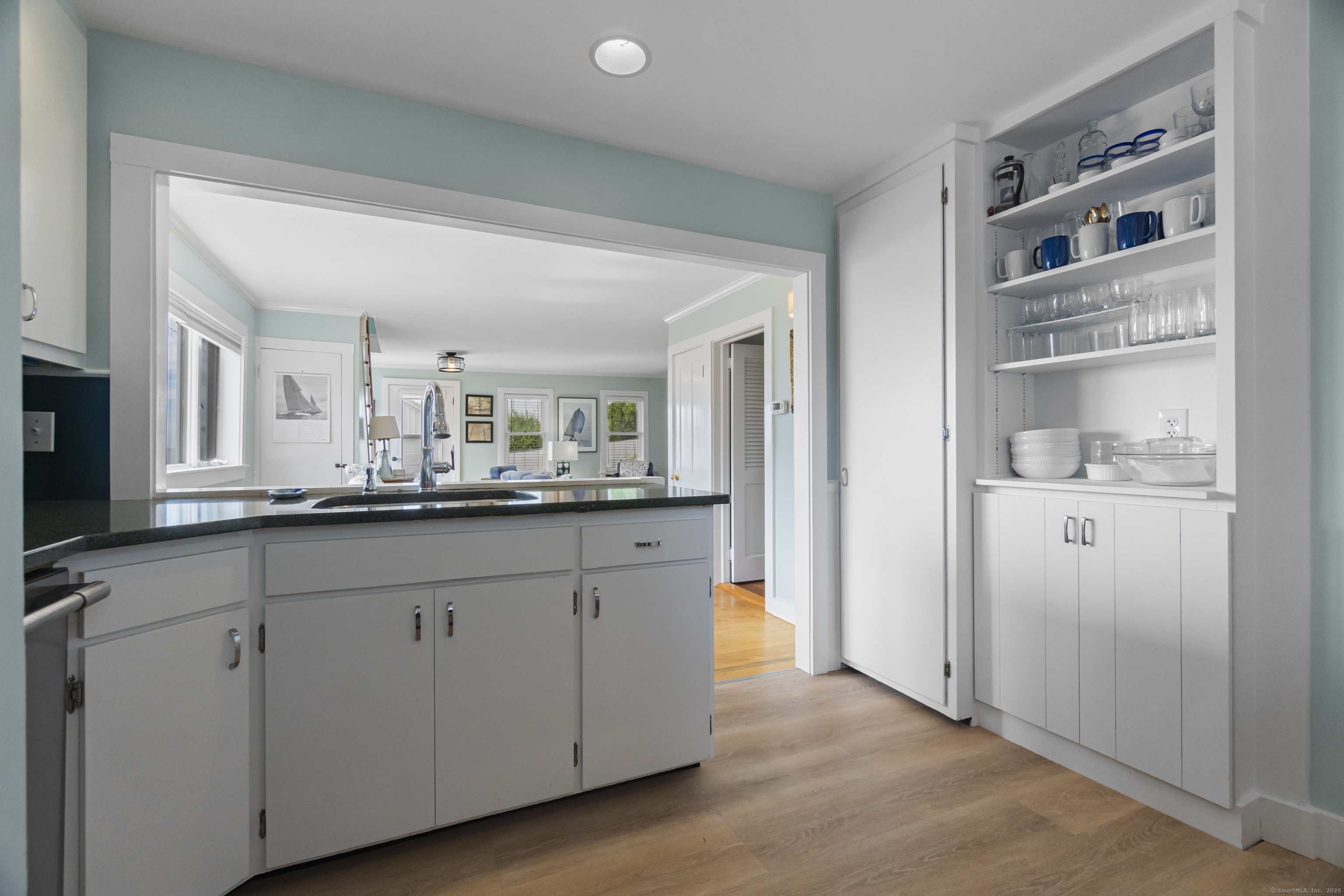 20 Omega Street Stonington, CT 06378 - Photo 20 of 37 a bathroom with a sink and a mirror