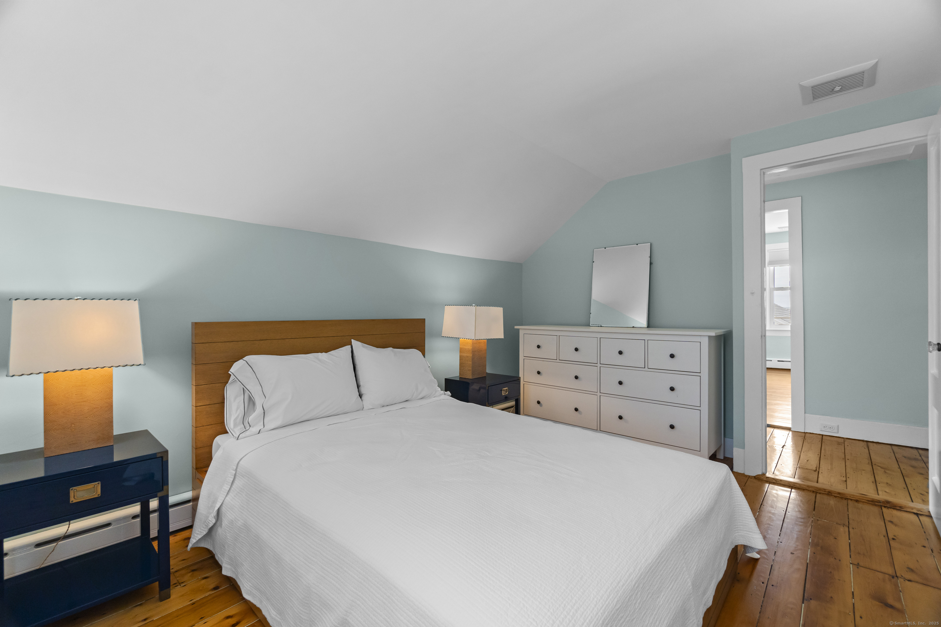 20 Omega Street Stonington, CT 06378 - Photo 25 of 37 a bed room with a bed and a night stand