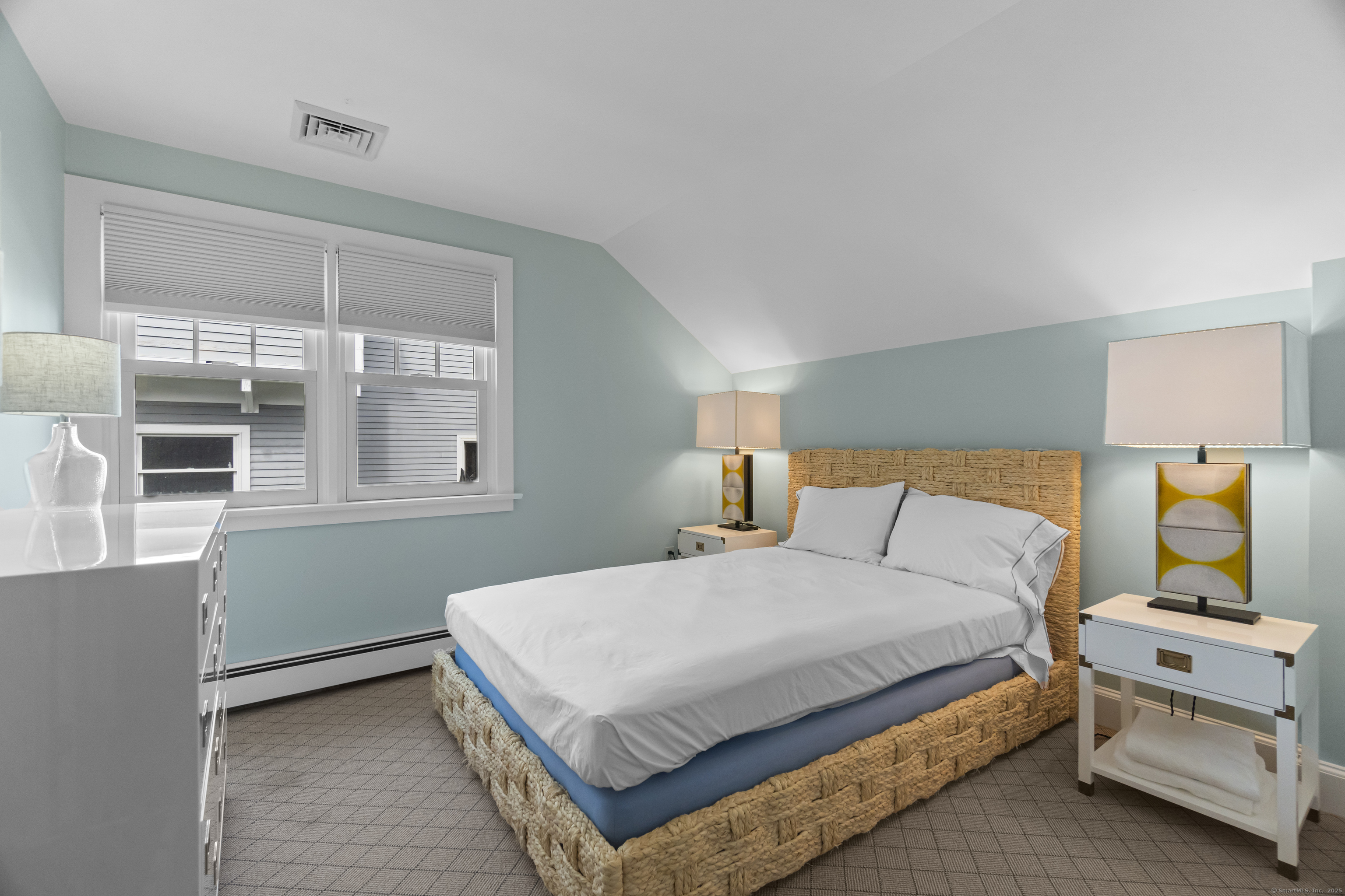 20 Omega Street Stonington, CT 06378 - Photo 26 of 37 a bedroom with a bed and a window