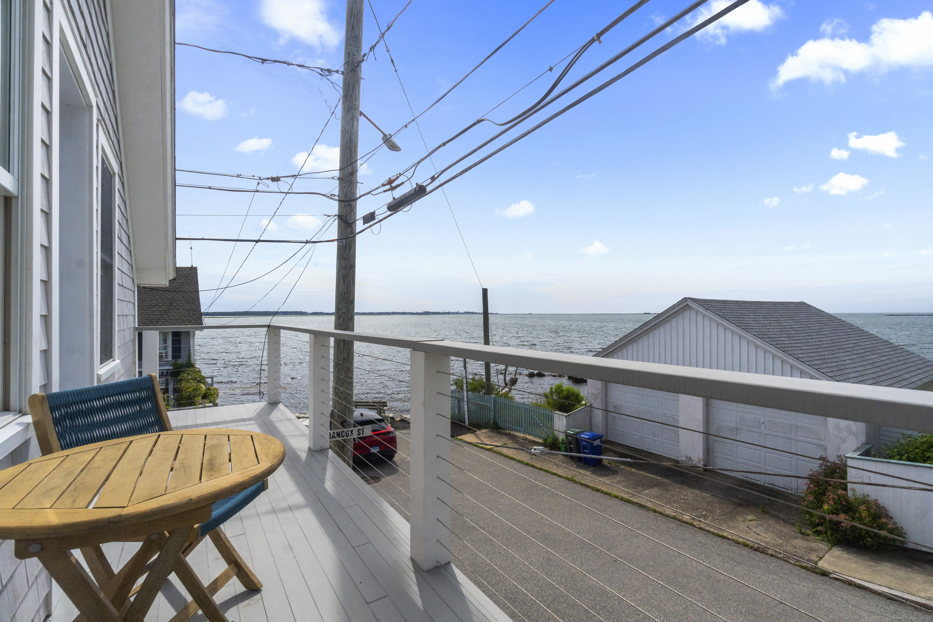 20 Omega Street Stonington, CT 06378 - Photo 27 of 37 a view of a balcony with furniture