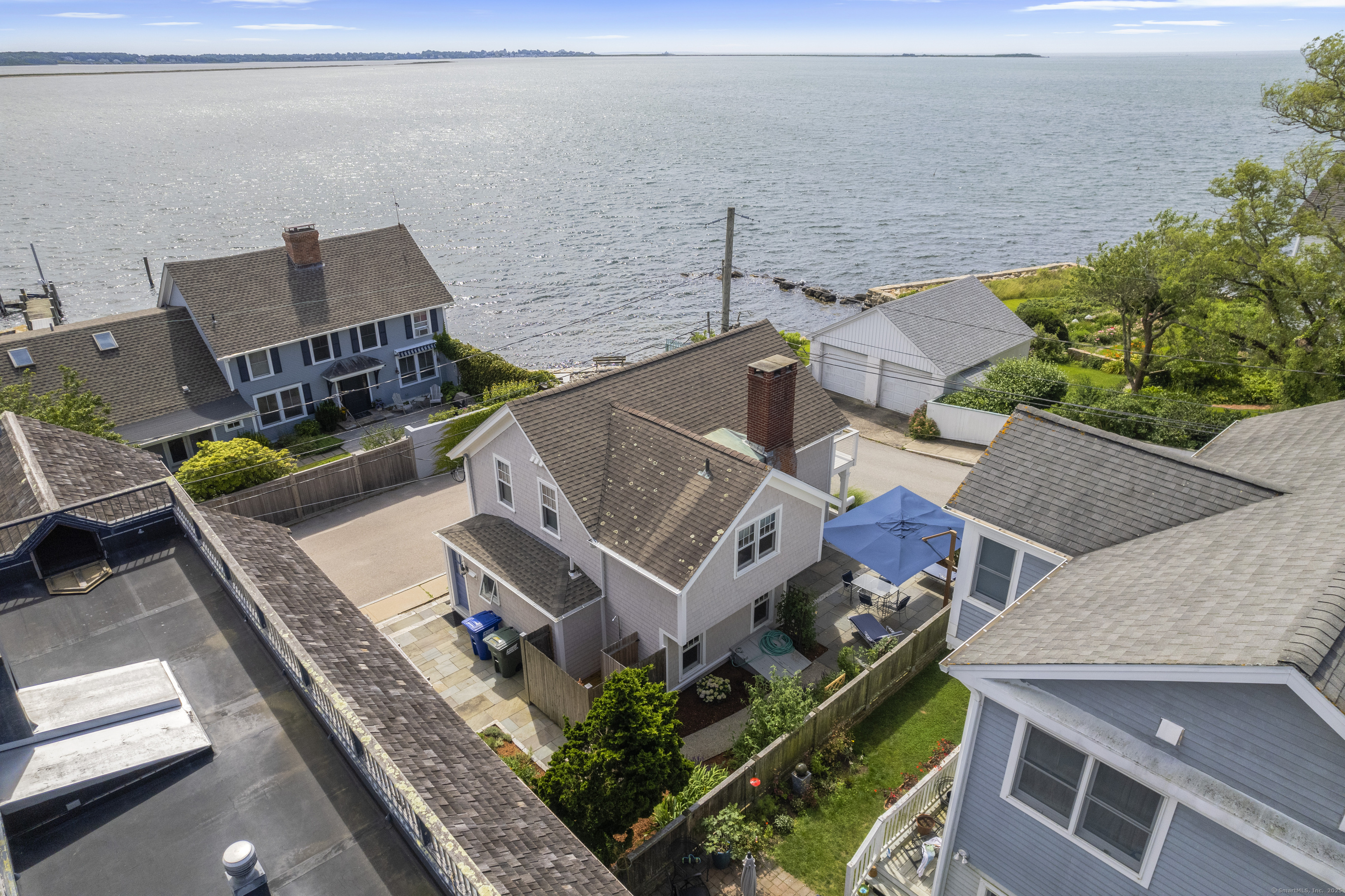 20 Omega Street Stonington, CT 06378 - Photo 34 of 37 an aerial view of a house with a garden