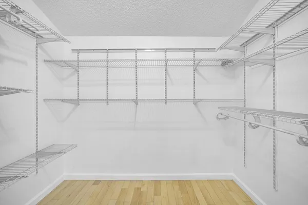 a bathroom with a shower and a bath tub
