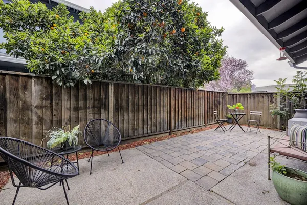 a view of a chairs and tables in the patio
