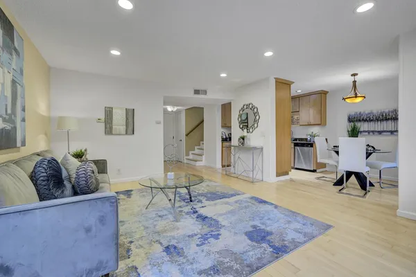 a living room with furniture and a couch