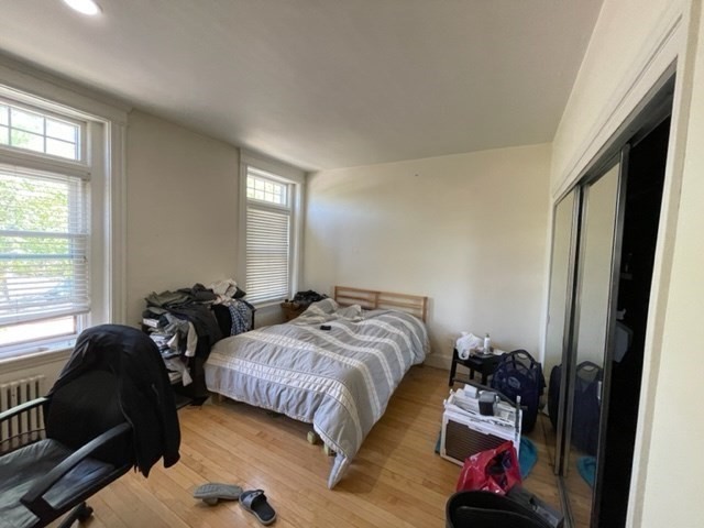 1793 Beacon Street, Unit 3 Brookline, MA 02445 - Photo 19 of 25 a bedroom with two beds and a window