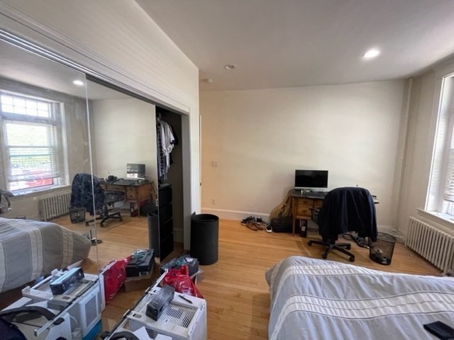 1793 Beacon Street, Unit 3 Brookline, MA 02445 - Photo 21 of 25 a bedroom with furniture and a window