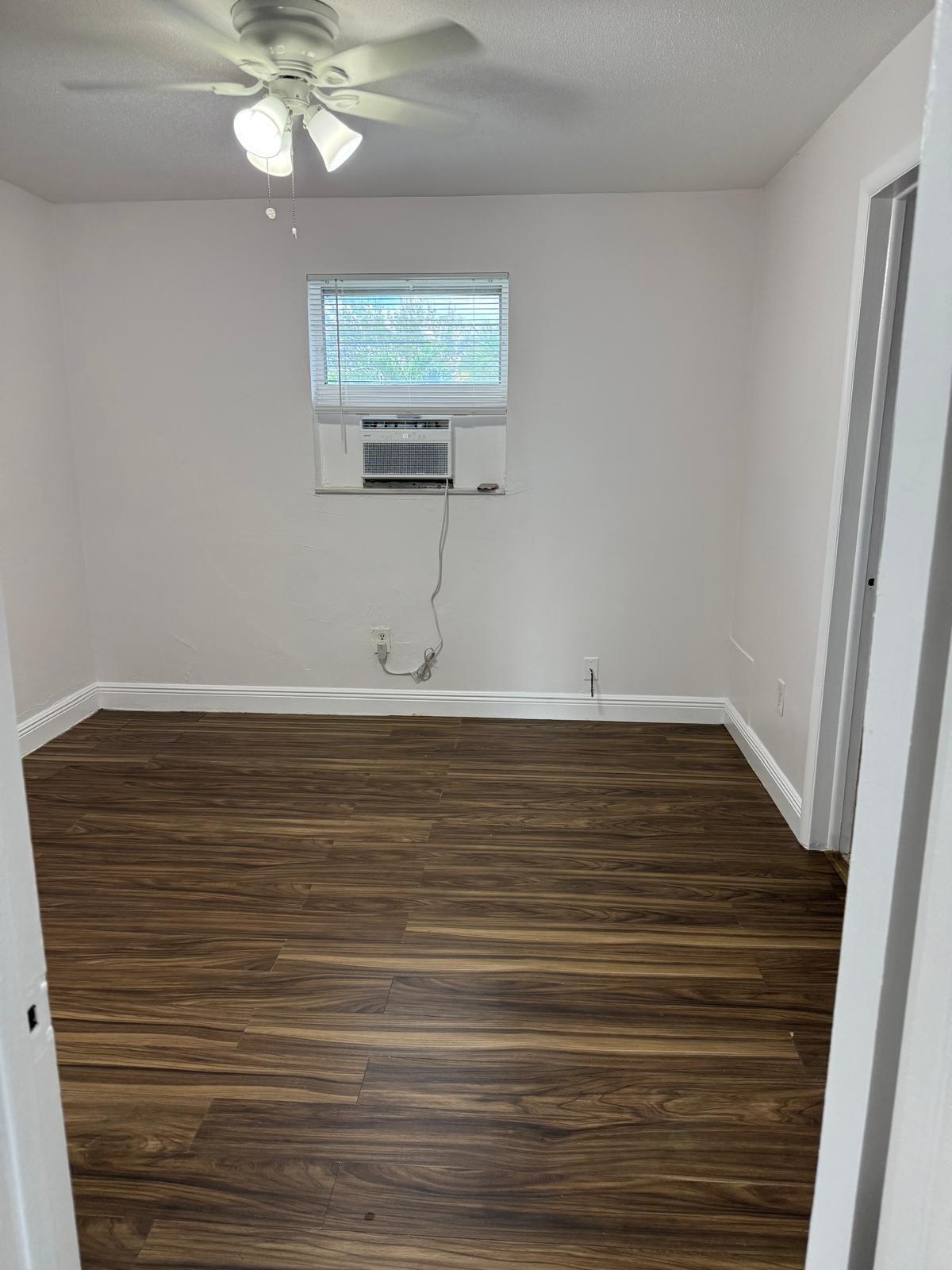 126 Cleveland Street, Unit 7 Lake Worth Beach, FL 33461 - Photo 12 of 24 a view of room with fan