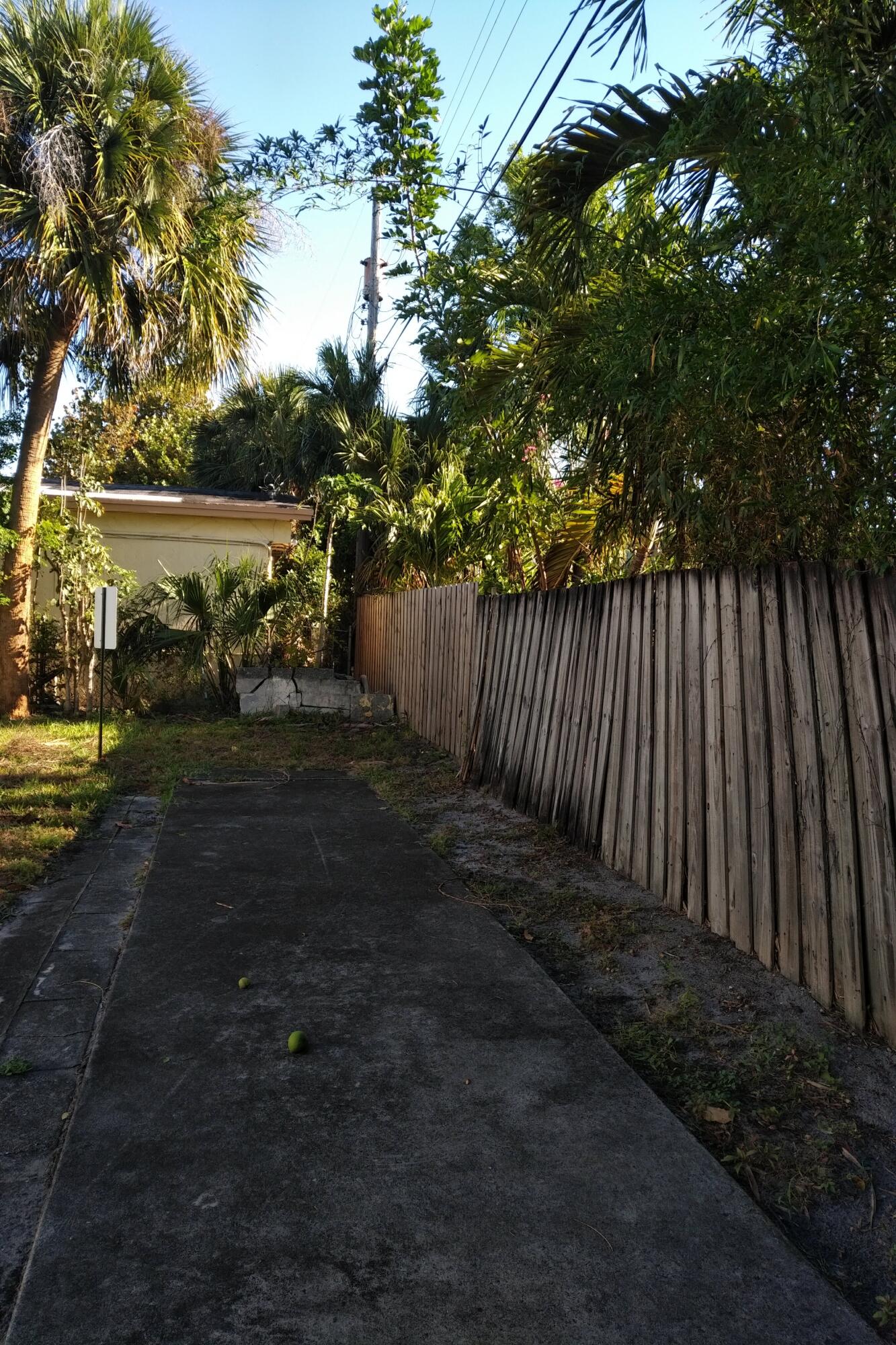 126 Cleveland Street, Unit 7 Lake Worth Beach, FL 33461 - Photo 18 of 24 a view of house with backyard and outdoor space