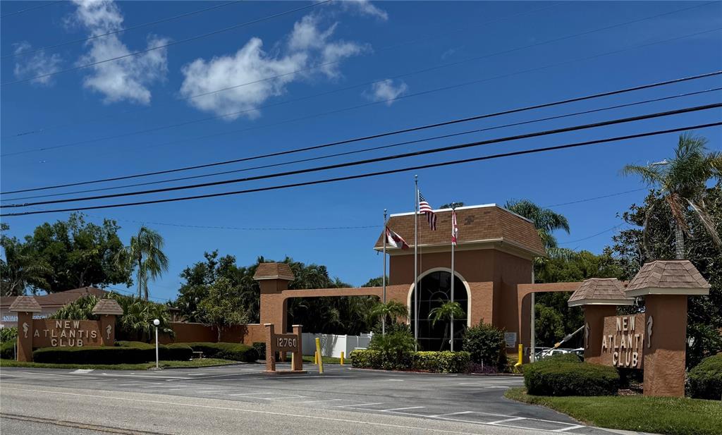 12760 Indian Rocks Road, Unit 1048 Largo, FL 33774 - Photo 23 of 24 a front view of a house with garden