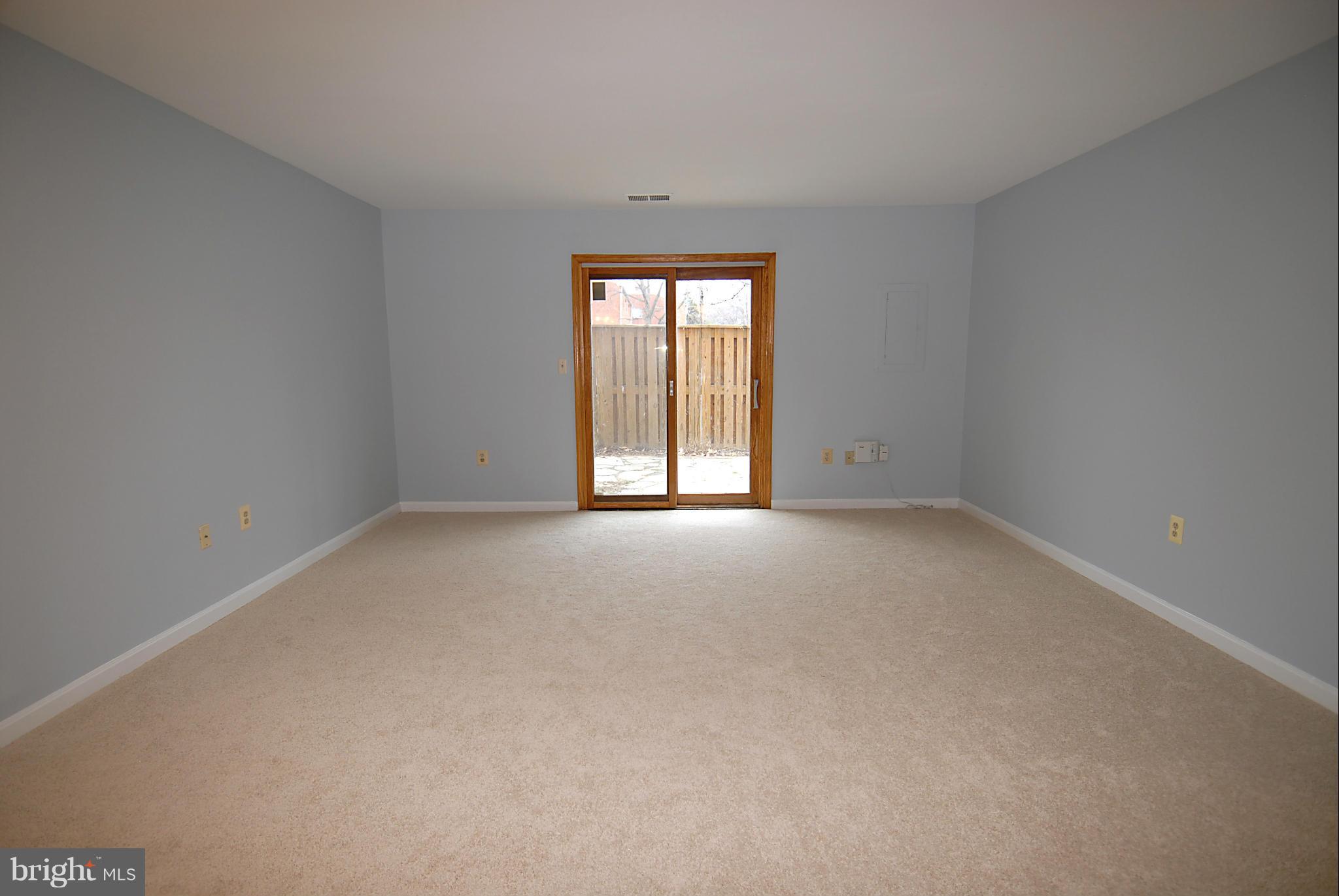 3914 9th Road South Arlington, VA 22204 - Photo 3 of 22 Sliding doors open to large enclosed patio