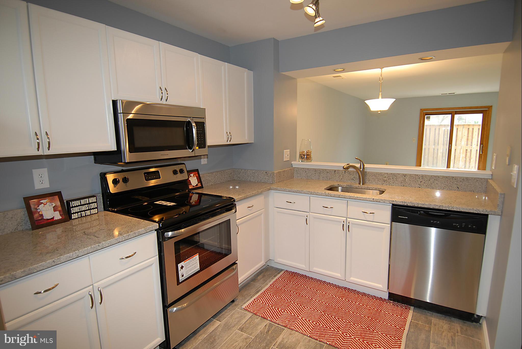 3914 9th Road South Arlington, VA 22204 - Photo 7 of 22 Kitchen features new stainless steel appliances