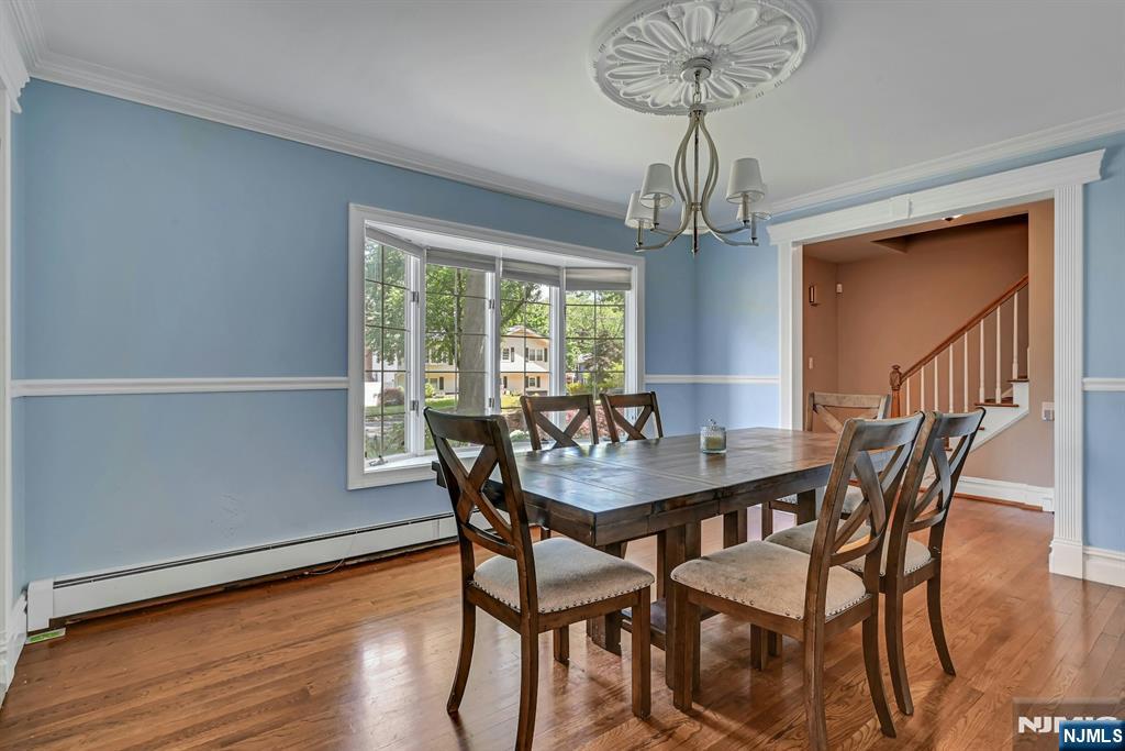 44 West Midland Avenue Paramus, NJ 07652 - Photo 6 of 19 a view of a dining room with furniture window and wooden floor