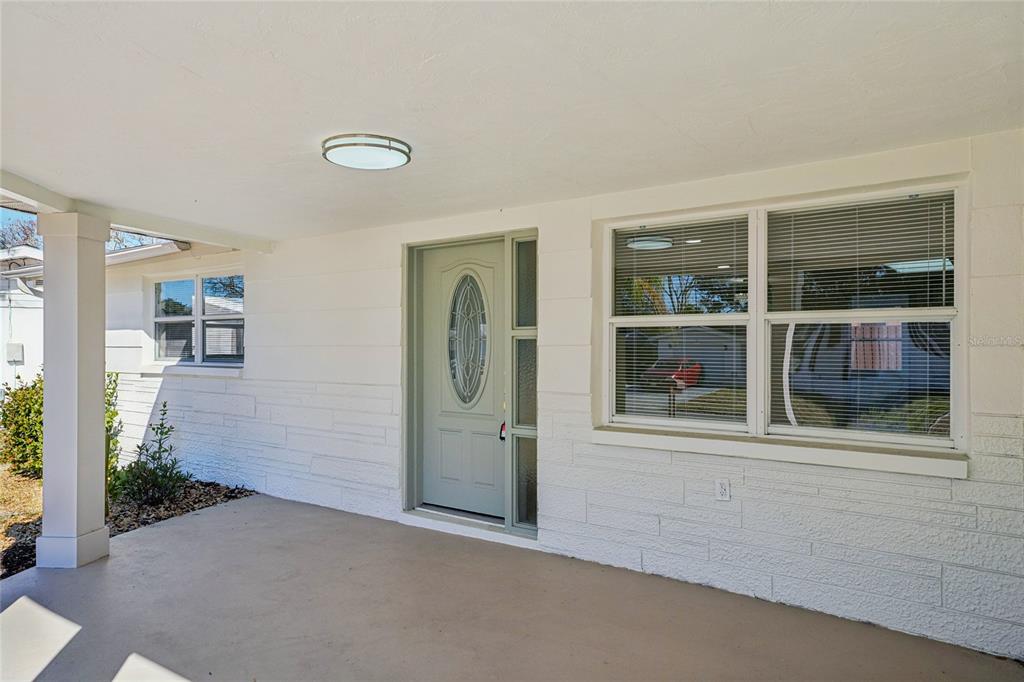 5753 10th Avenue New Port Richey, FL 34652 - Photo 5 of 46 an empty room with windows