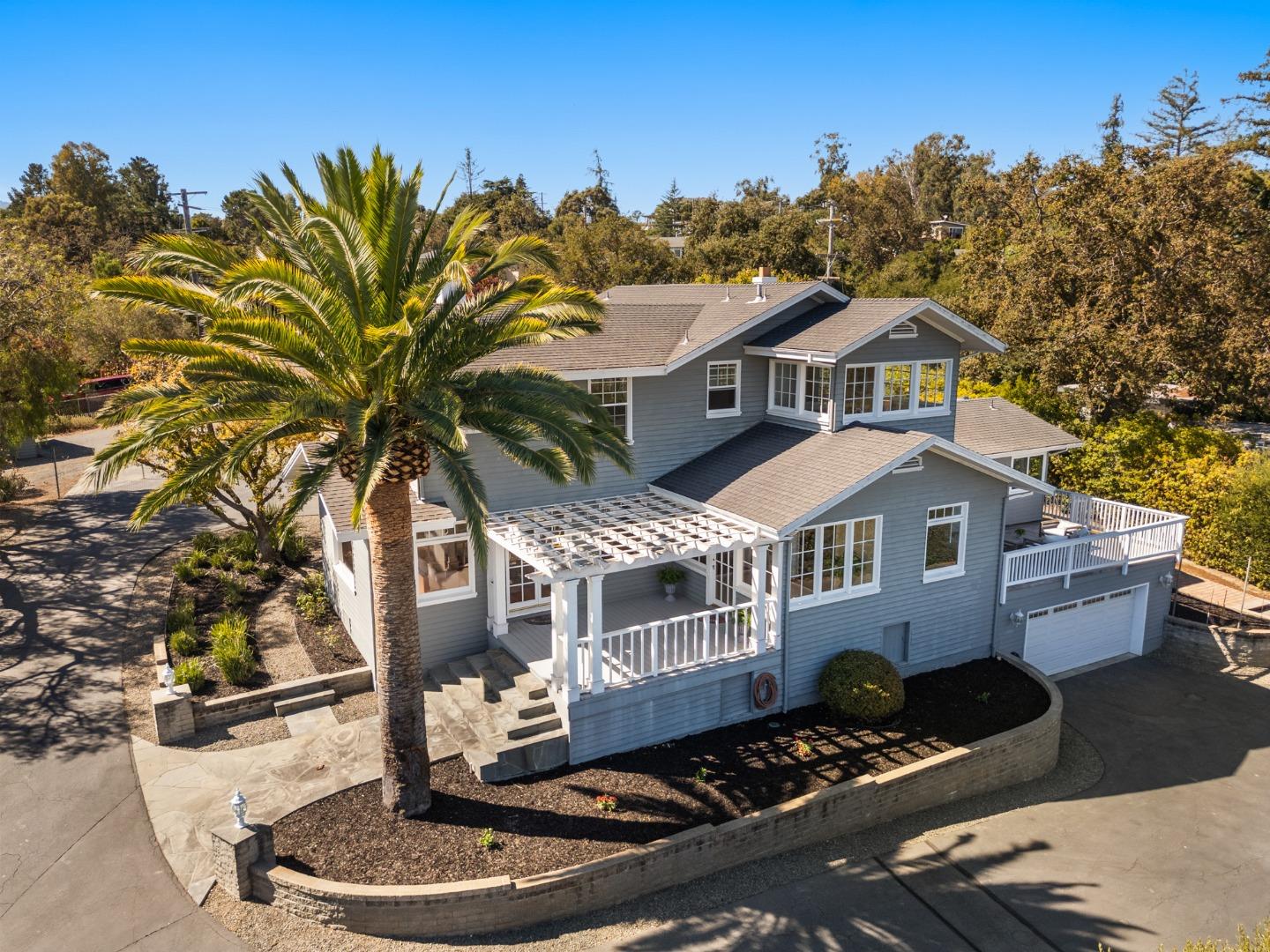 681 Upland Road Redwood City, CA 94062 - Photo 2 of 85 a front view of a house with a yard