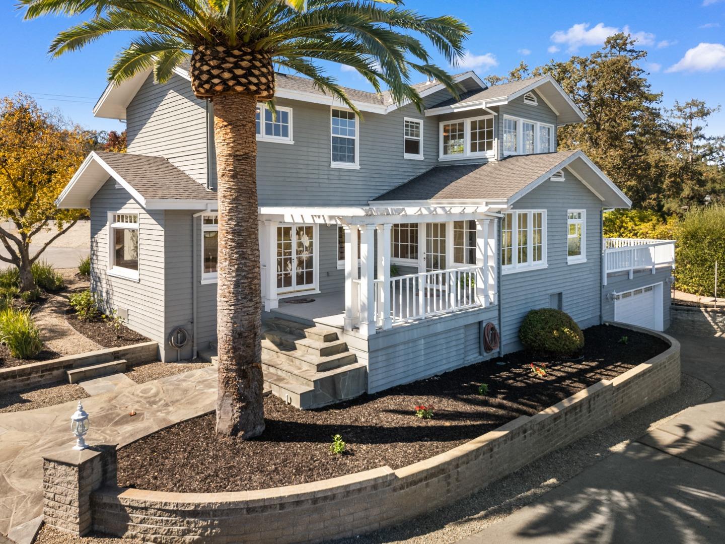 681 Upland Road Redwood City, CA 94062 - Photo 3 of 85 a front view of a house with a yard