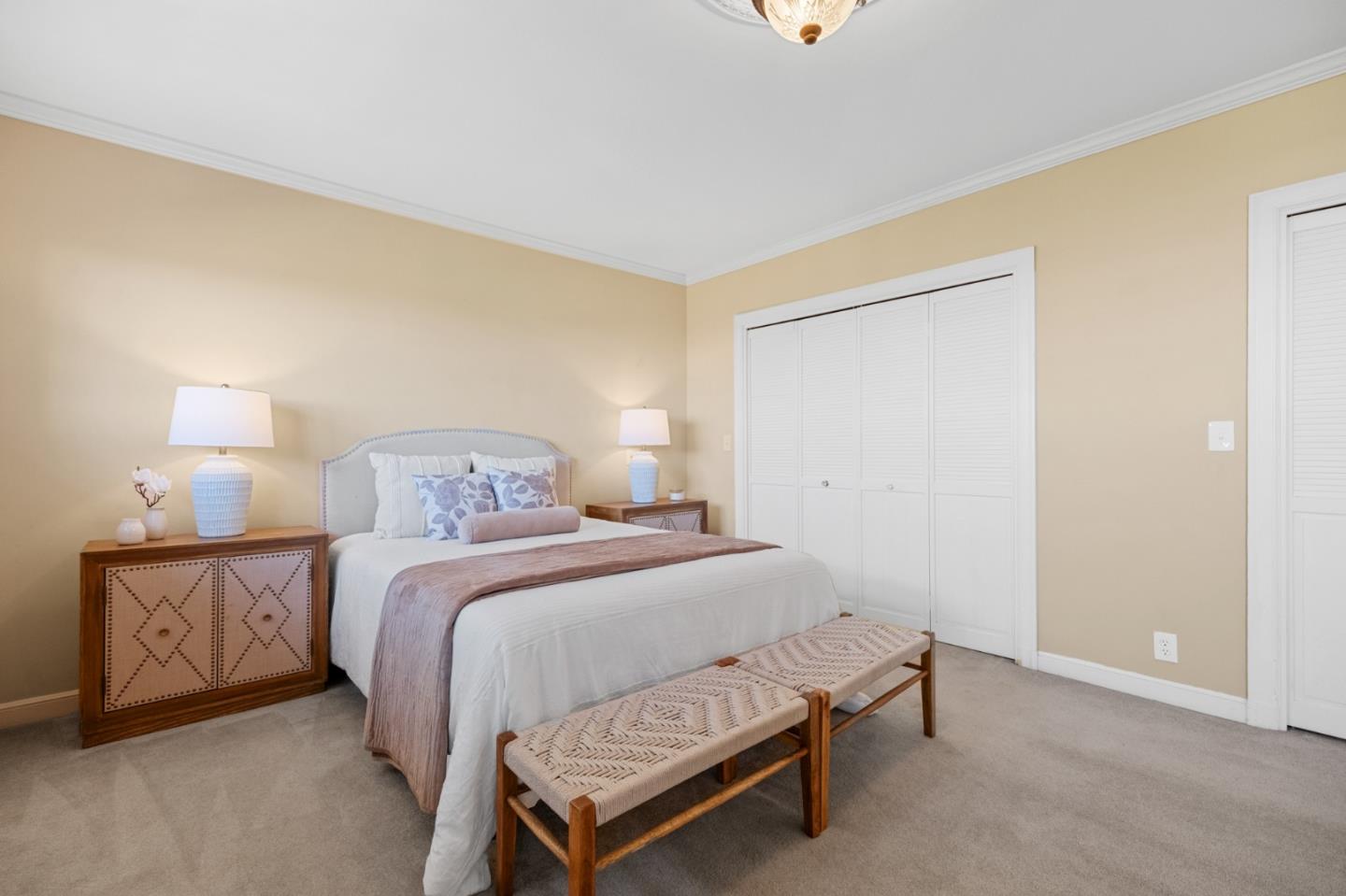 681 Upland Road Redwood City, CA 94062 - Photo 34 of 85 a bedroom with a bed and a night stand