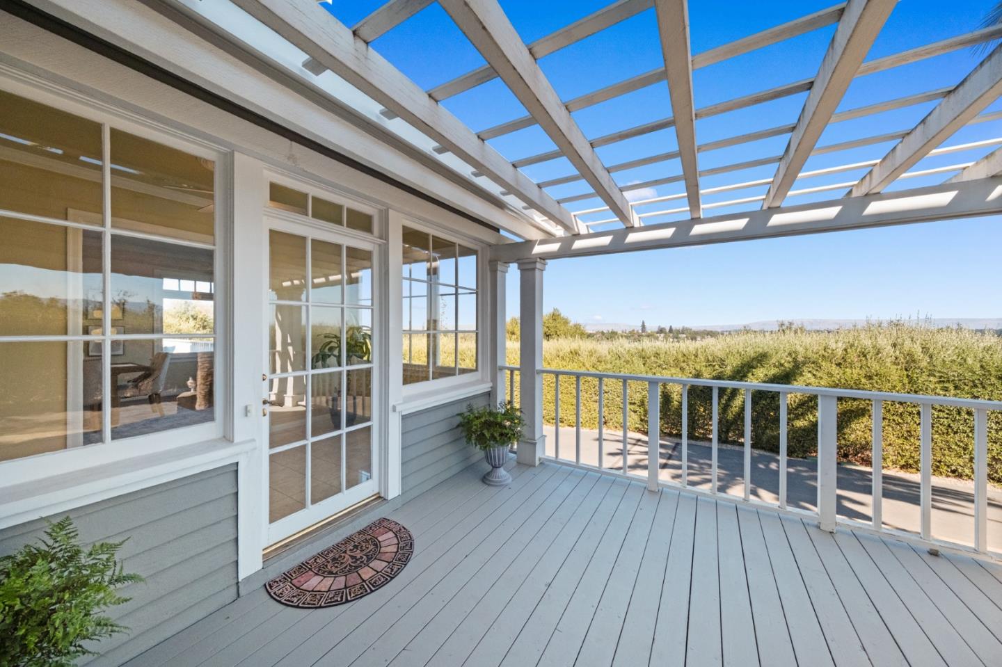 681 Upland Road Redwood City, CA 94062 - Photo 57 of 85 a balcony with wooden floor