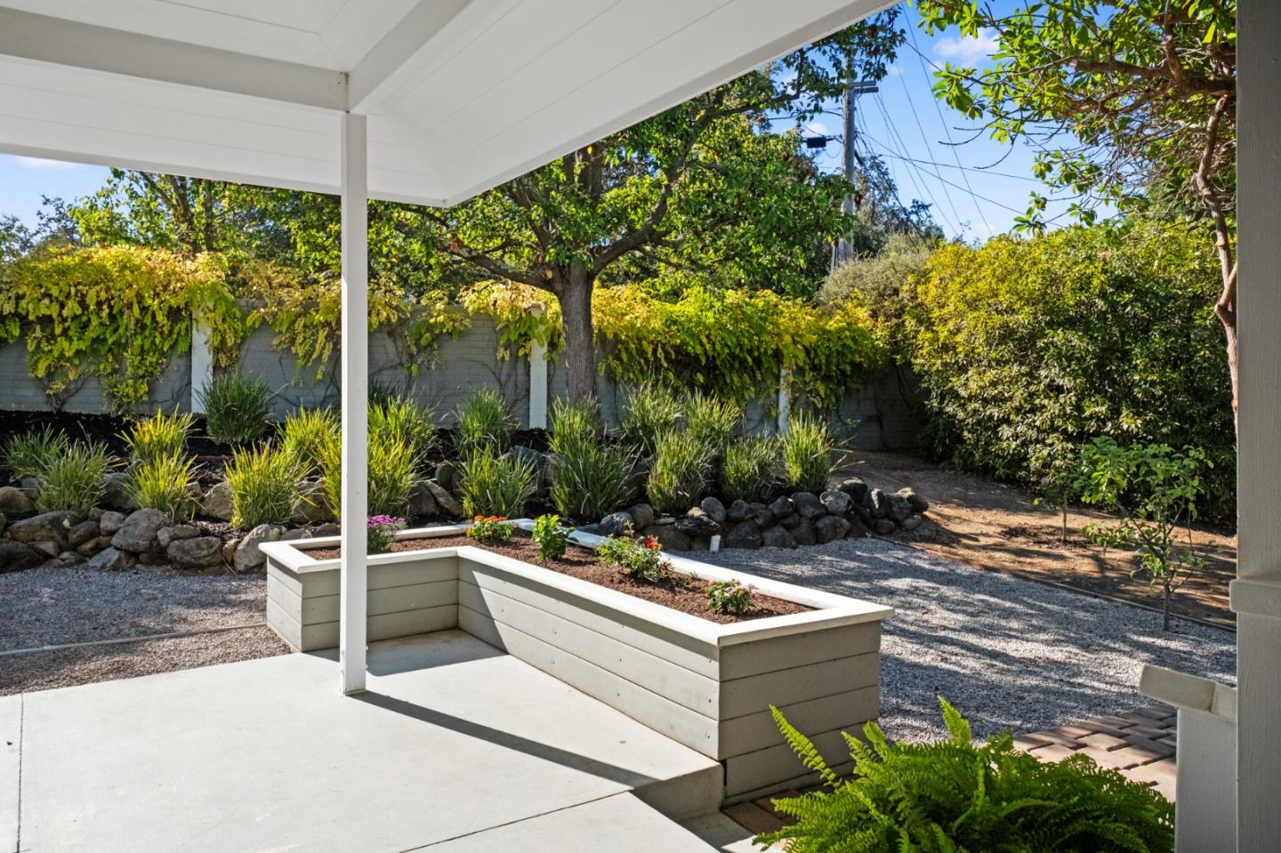 681 Upland Road Redwood City, CA 94062 - Photo 67 of 85 a view of a patio with chairs and potted plants