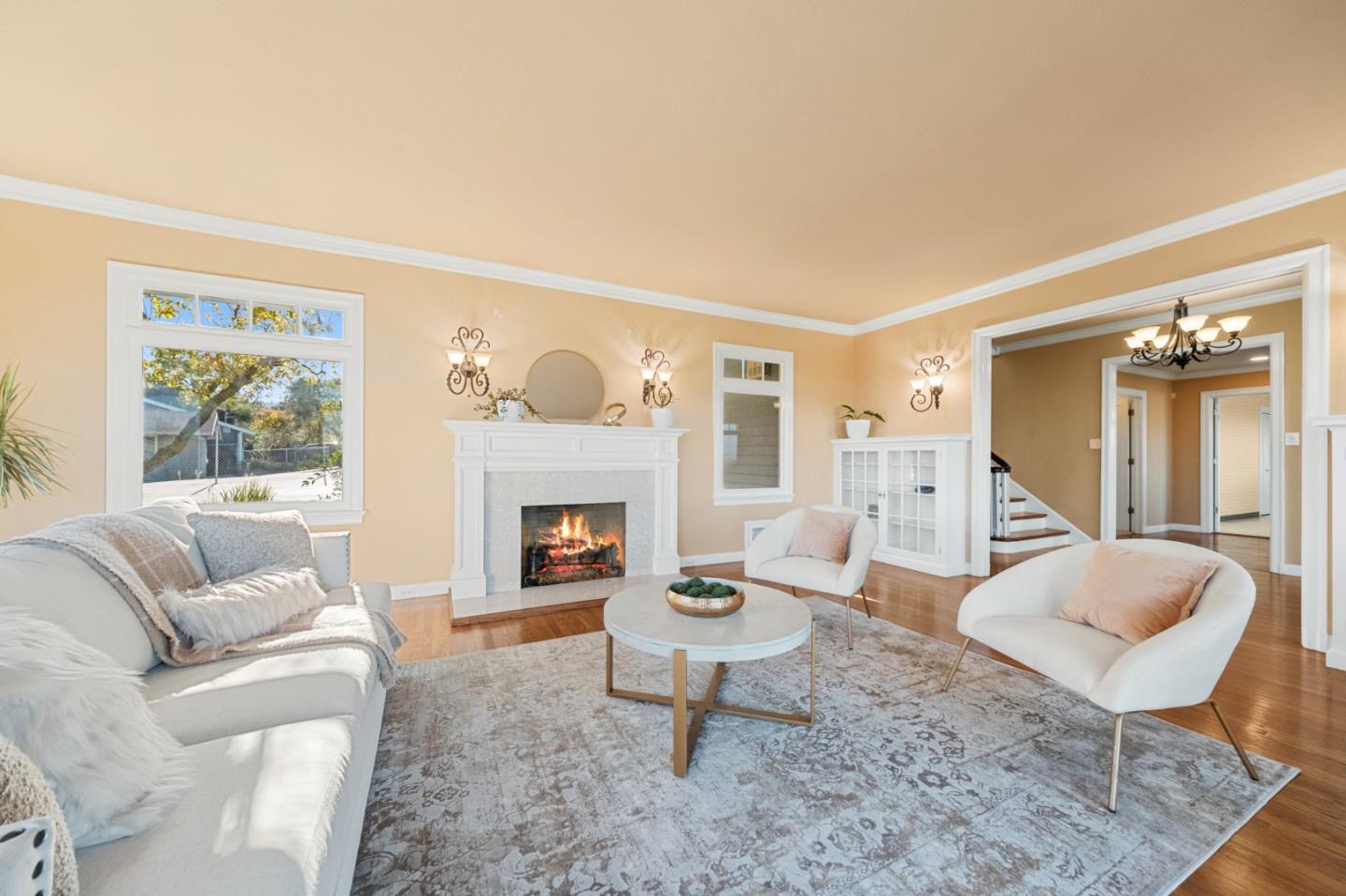 681 Upland Road Redwood City, CA 94062 - Photo 7 of 85 a living room with furniture a rug and a fireplace