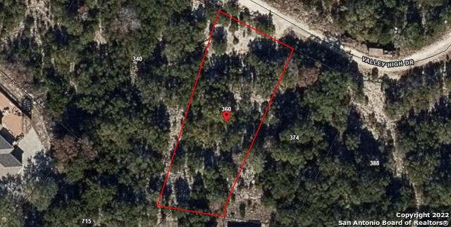 360 Valley High Drive Spring Branch, TX 78070 - Photo 1 of 1 a backyard of a house with lots of green space