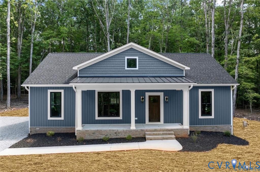 227 Oak Run Clarksville, VA 23927 - Photo 1 of 12 a front view of a house with a yard