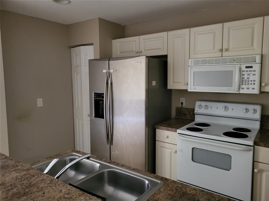 1957 Freeport Drive, Unit 1957 Riviera Beach, FL 33404 - Photo 6 of 14