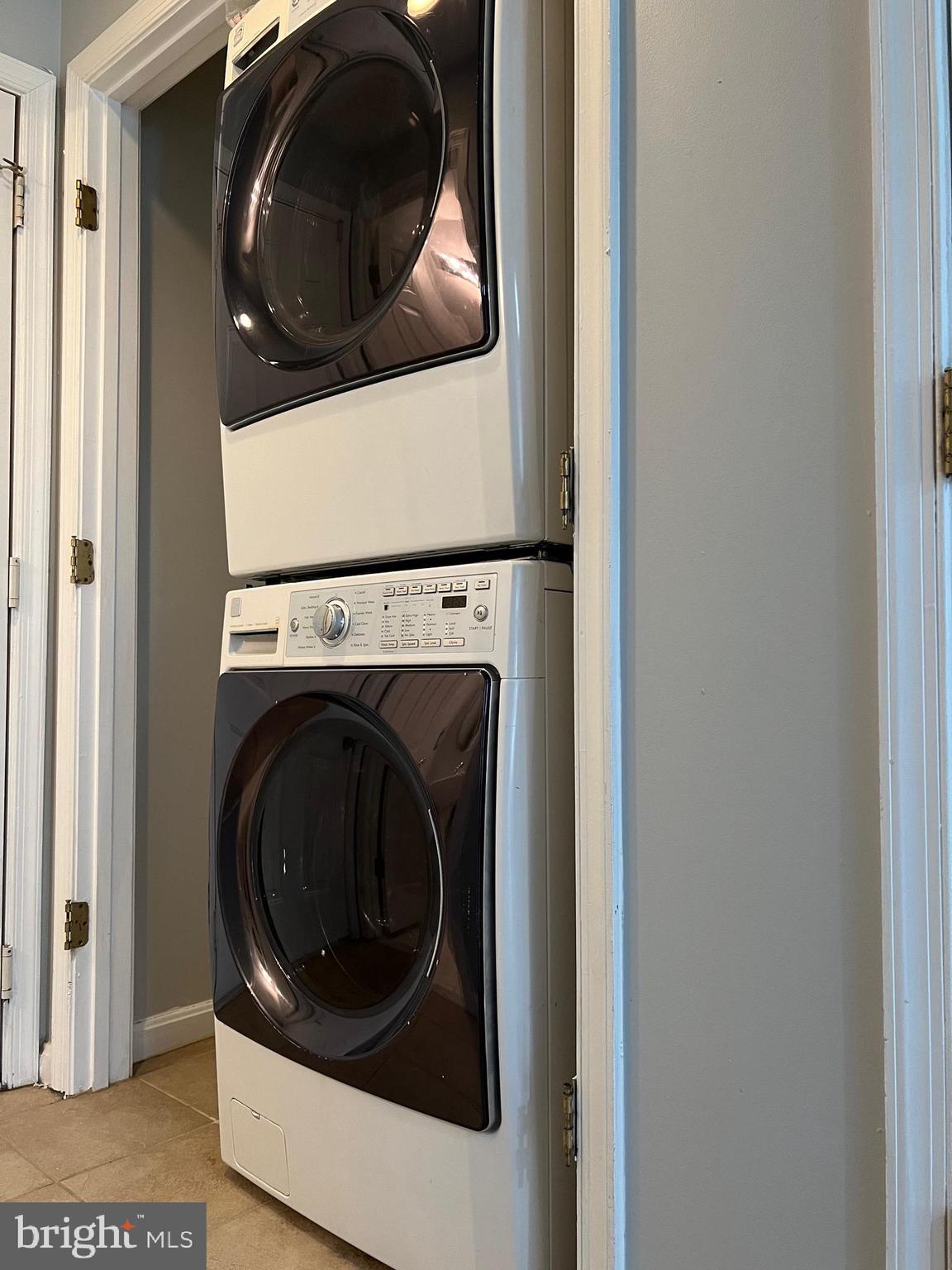 13001 Bridger Drive, Unit 1514 Germantown, MD 20874 - Photo 14 of 15 a close up view of a washer and dryer
