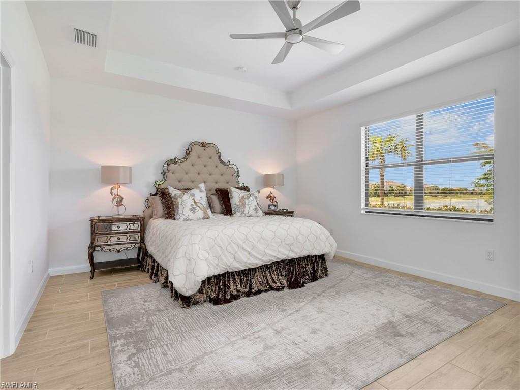 18278 Ridgeline Drive Estero, FL 33928 - Photo 16 of 45 a bedroom with a bed and a window