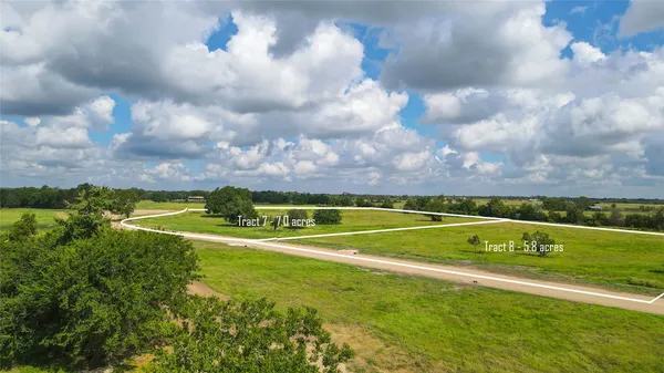 a view of a house with a big yard