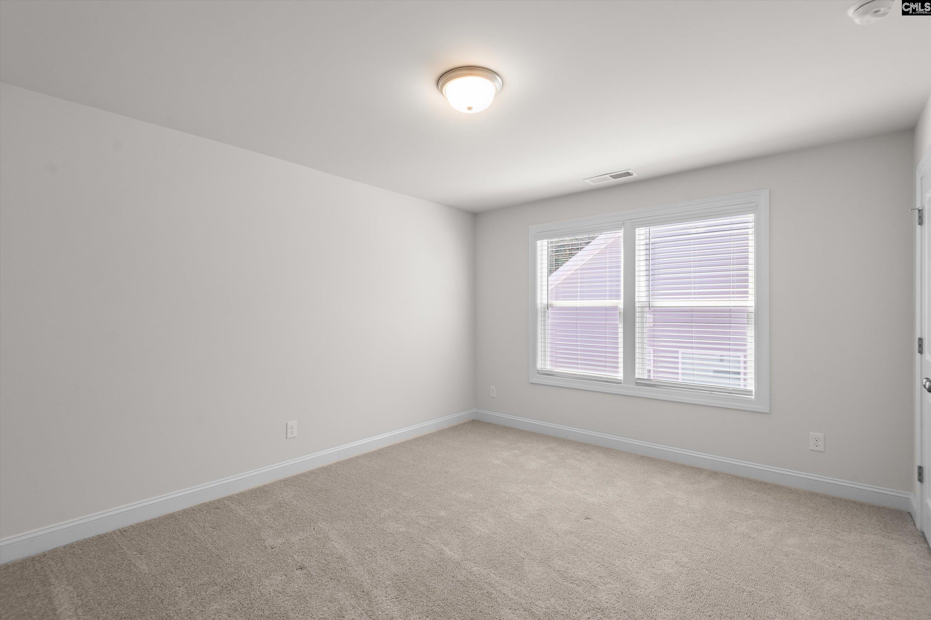 558 Wild Ginger Loop Irmo, SC 29063 - Photo 32 of 42 an empty room with a window