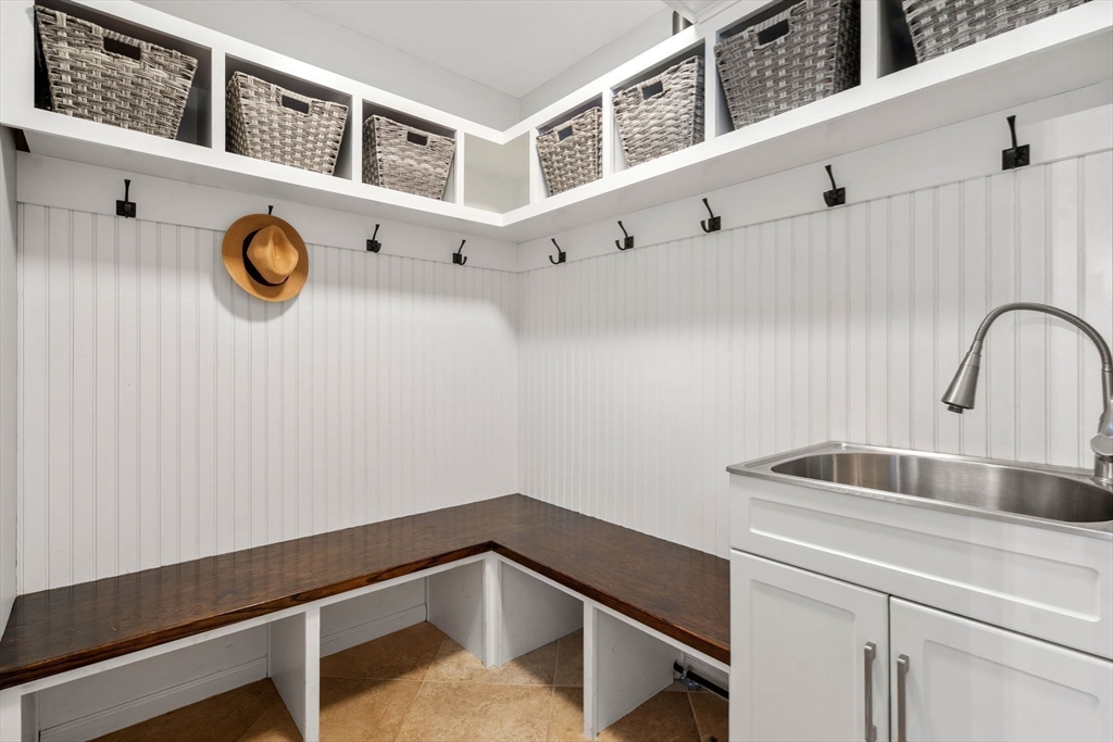 11 Iron Hollow Road Sharon, MA 02067 - Photo 13 of 42 a bathroom with a sink and a mirror