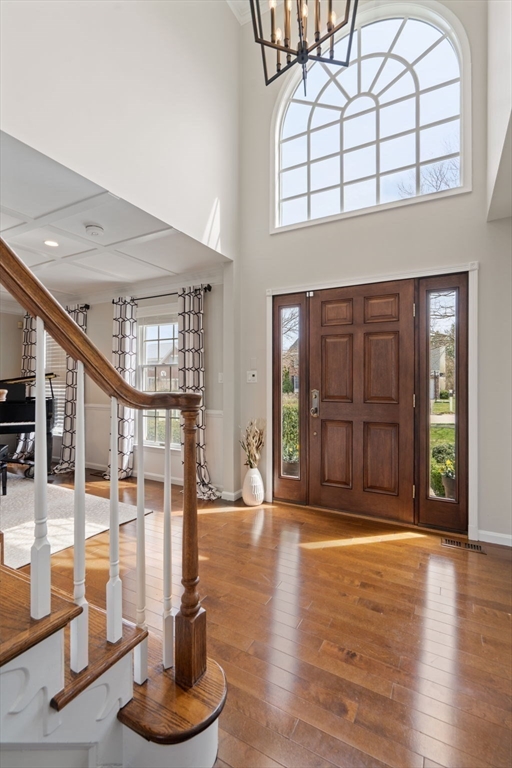 11 Iron Hollow Road Sharon, MA 02067 - Photo 15 of 42 a view of an entryway with wooden floor and door