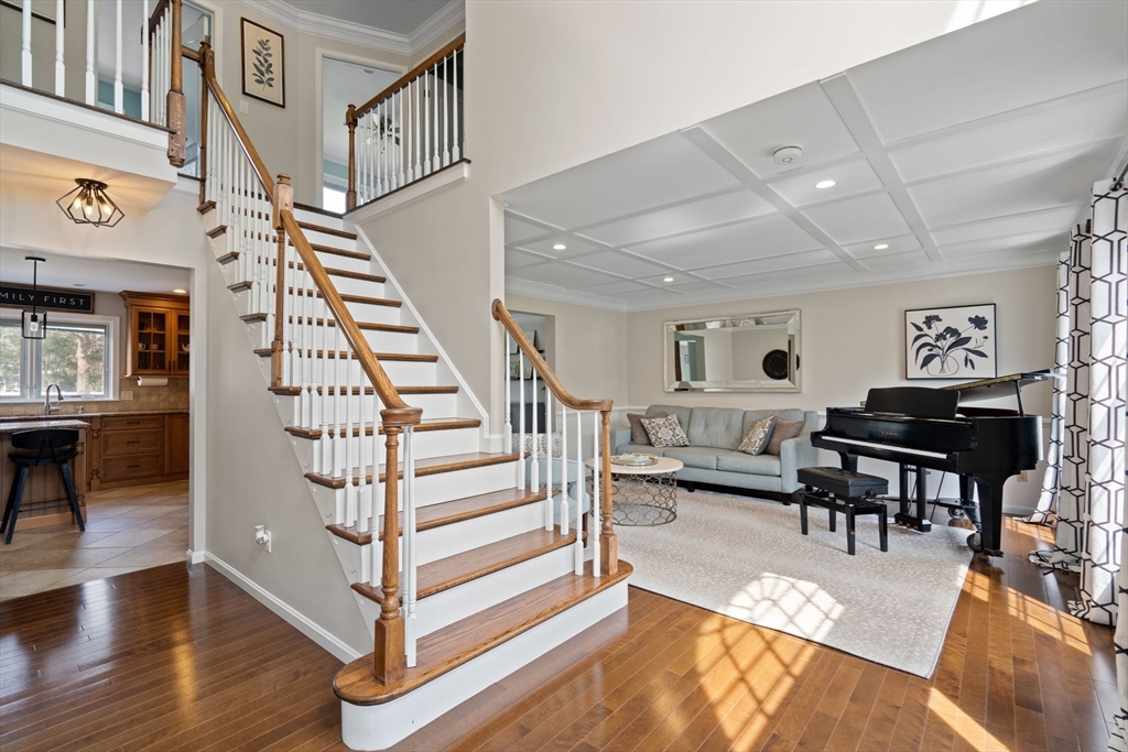 11 Iron Hollow Road Sharon, MA 02067 - Photo 2 of 42 a view of entryway livingroom and hall with wooden floor