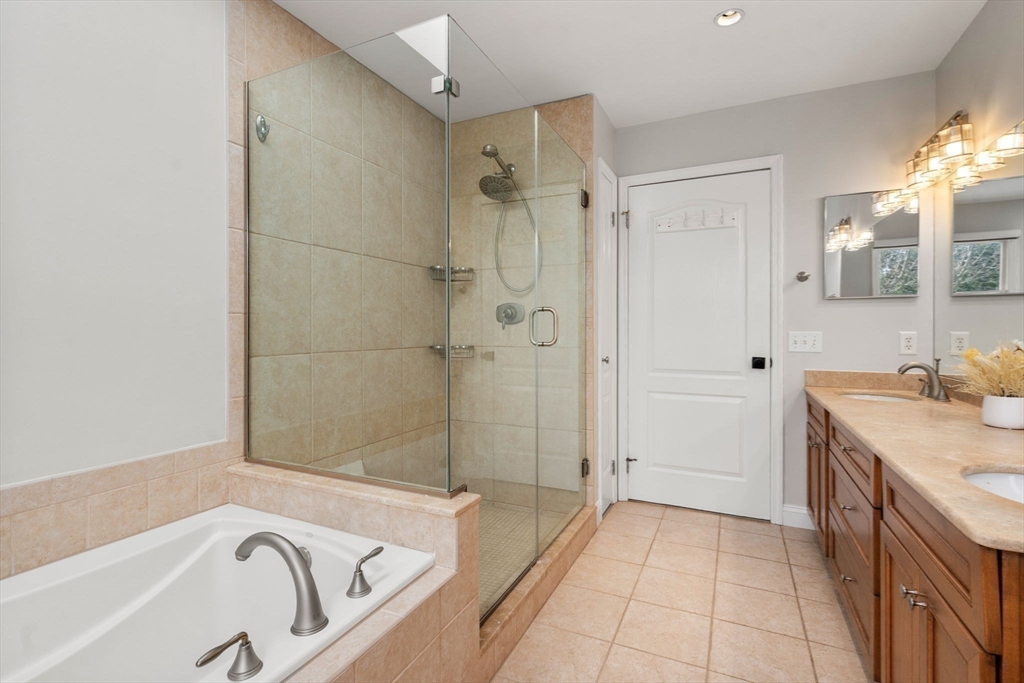 11 Iron Hollow Road Sharon, MA 02067 - Photo 21 of 42 a bathroom with a bathtub and a sink