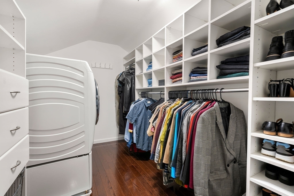 11 Iron Hollow Road Sharon, MA 02067 - Photo 22 of 42 a view of walk in closet with clothes and shoes