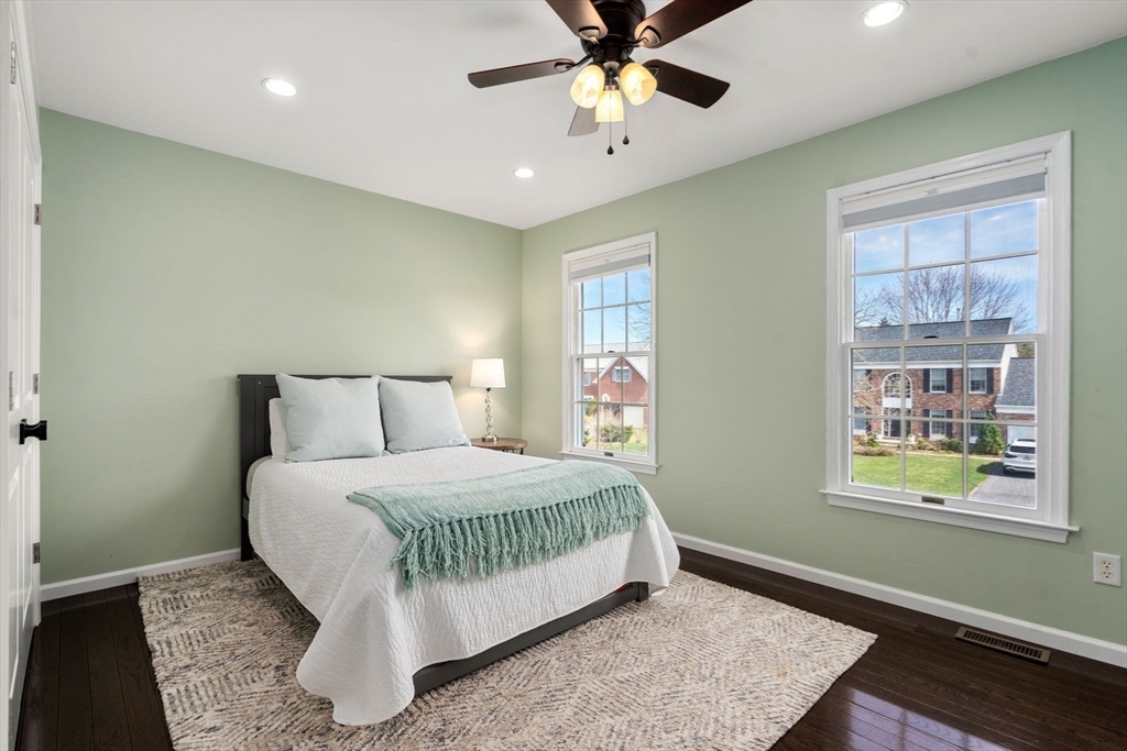11 Iron Hollow Road Sharon, MA 02067 - Photo 24 of 42 a bedroom with a bed and window