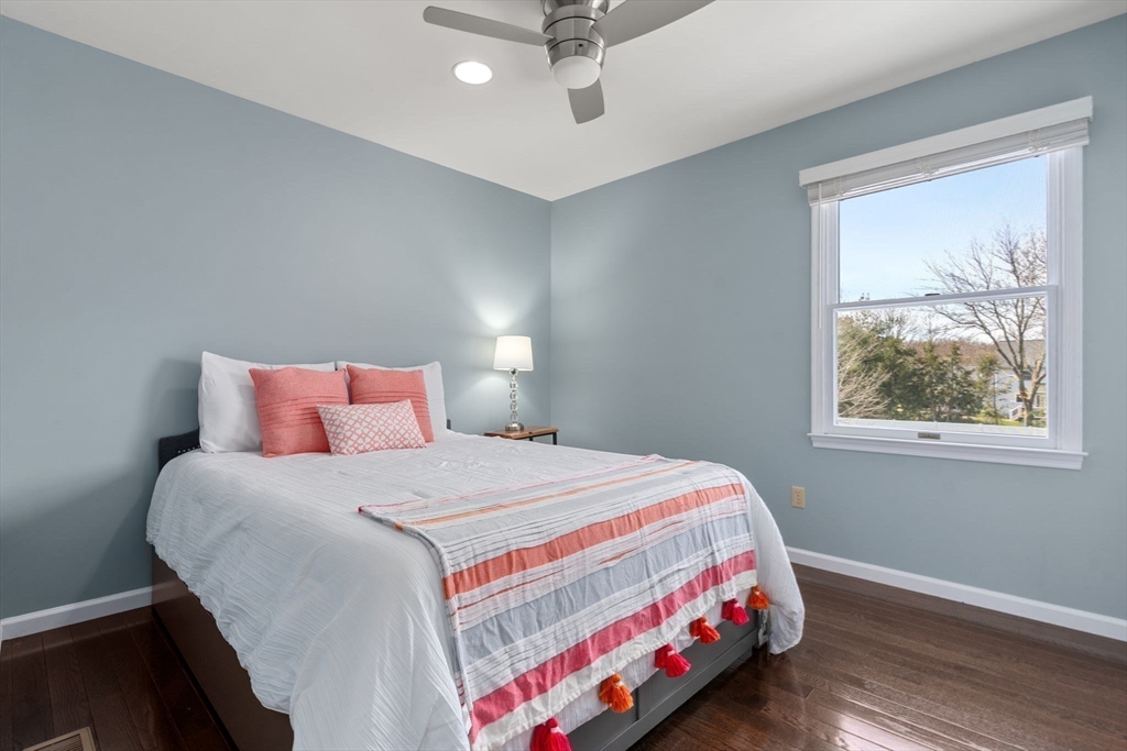 11 Iron Hollow Road Sharon, MA 02067 - Photo 25 of 42 a bedroom with a bed and window