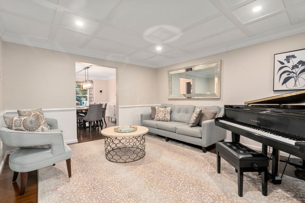 11 Iron Hollow Road Sharon, MA 02067 - Photo 4 of 42 a living room with furniture and a piano