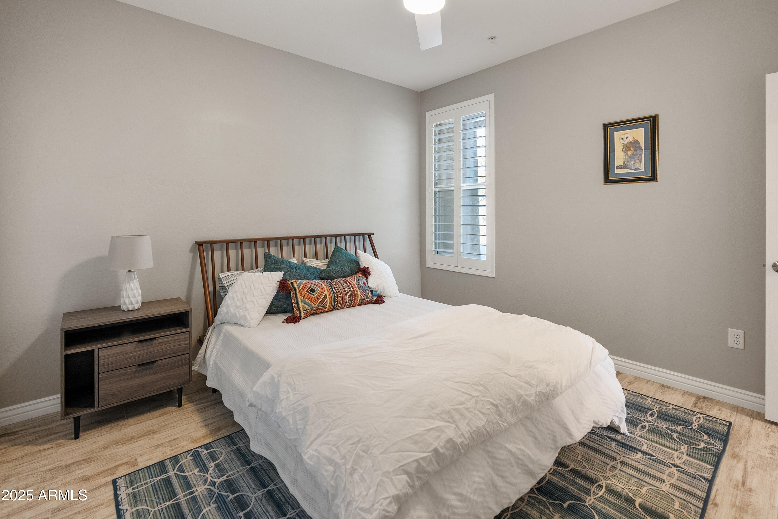 2425 West Bronco Butte Trail, Unit 1014 Phoenix, AZ 85085 - Photo 9 of 23 a bedroom with a bed and window